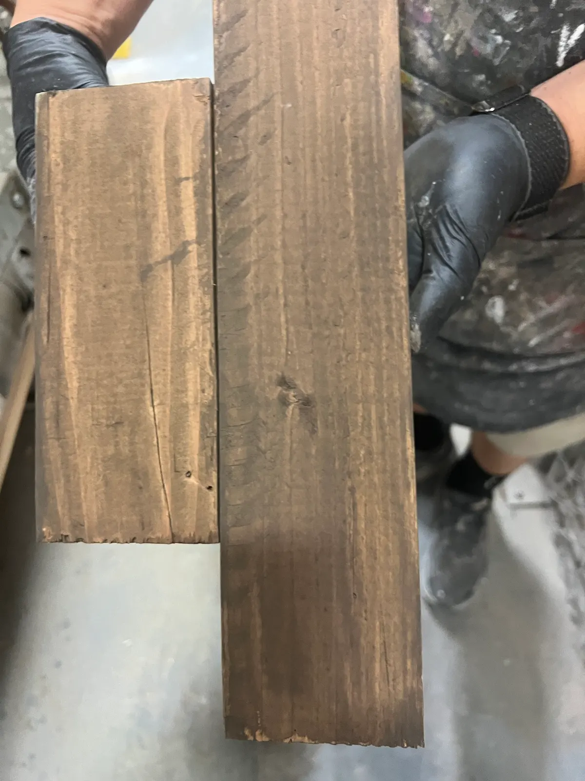 Two scrap boards showing the dark brown stain test